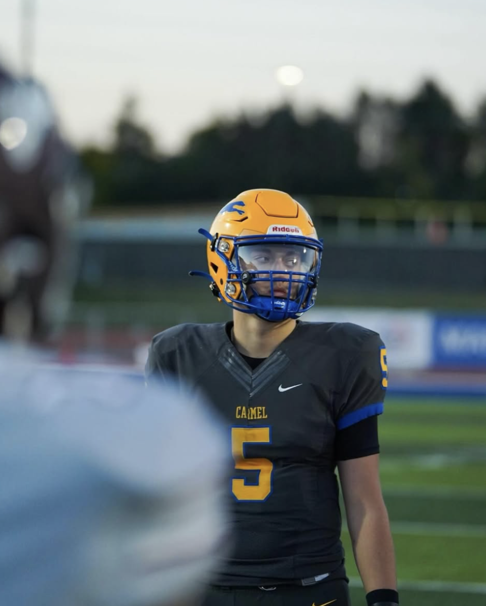 Junior Anthony Coellner poses on the field before a game. Coellner explained how the spread of social media helps an athletes' opportunity.